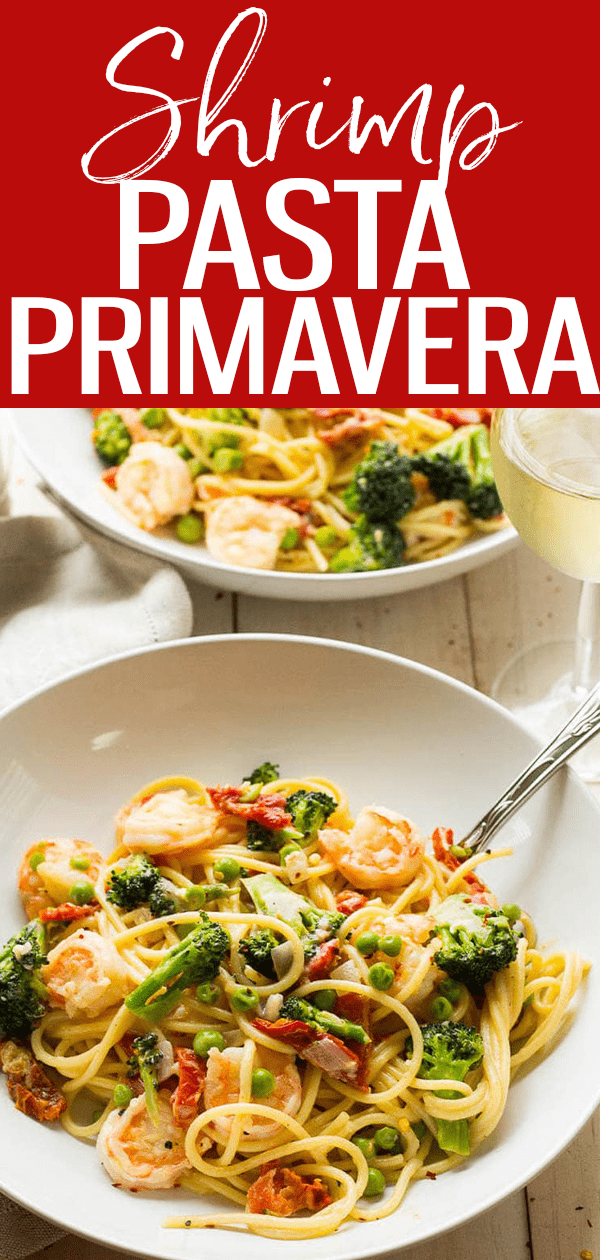 This Lighter Pasta Primavera with Shrimp is made with sundried tomatoes, broccoli and peas in a delicious lemon-parmesan sauce. #pastaprimavera #shrimppasta