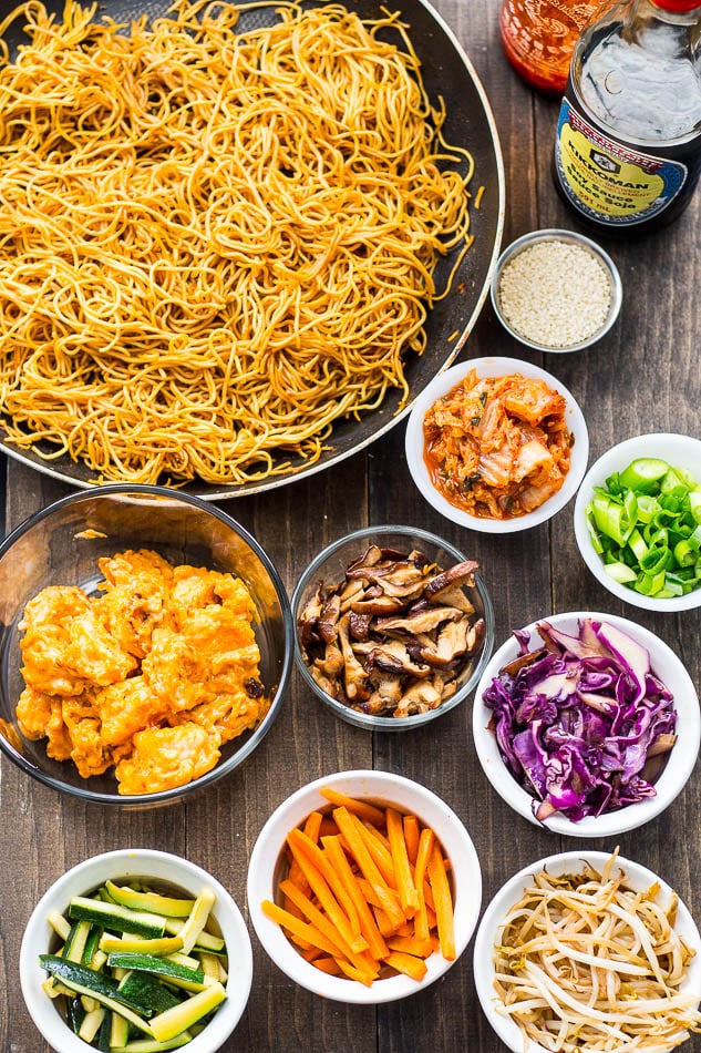 These Bang Bang Shrimp Bibimbap Noodle Bowls are filled with sweet, crunchy chili-garlic shrimp, a fried egg, kimchi and lots of sesame flavoured toppings! 