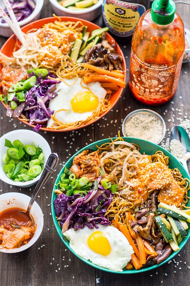 These Bang Bang Shrimp Bibimbap Noodle Bowls are filled with sweet, crunchy chili-garlic shrimp, a fried egg, kimchi and lots of sesame flavoured toppings! 