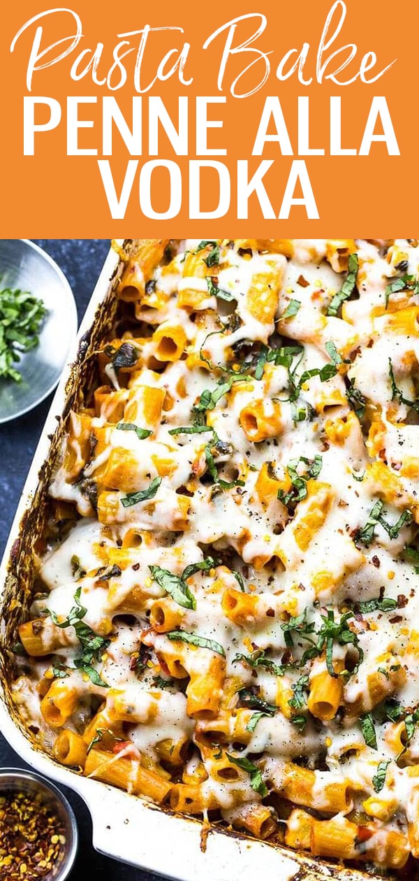 This Penne alla Vodka Pasta Bake is a hearty, rich spin on classic Italian comfort food. Creamy, velvety tomato-based vodka sauce, layers of spinach, red pepper and chicken with a cheesy top make this pasta bake unforgettable! #pasta #vodkasauce