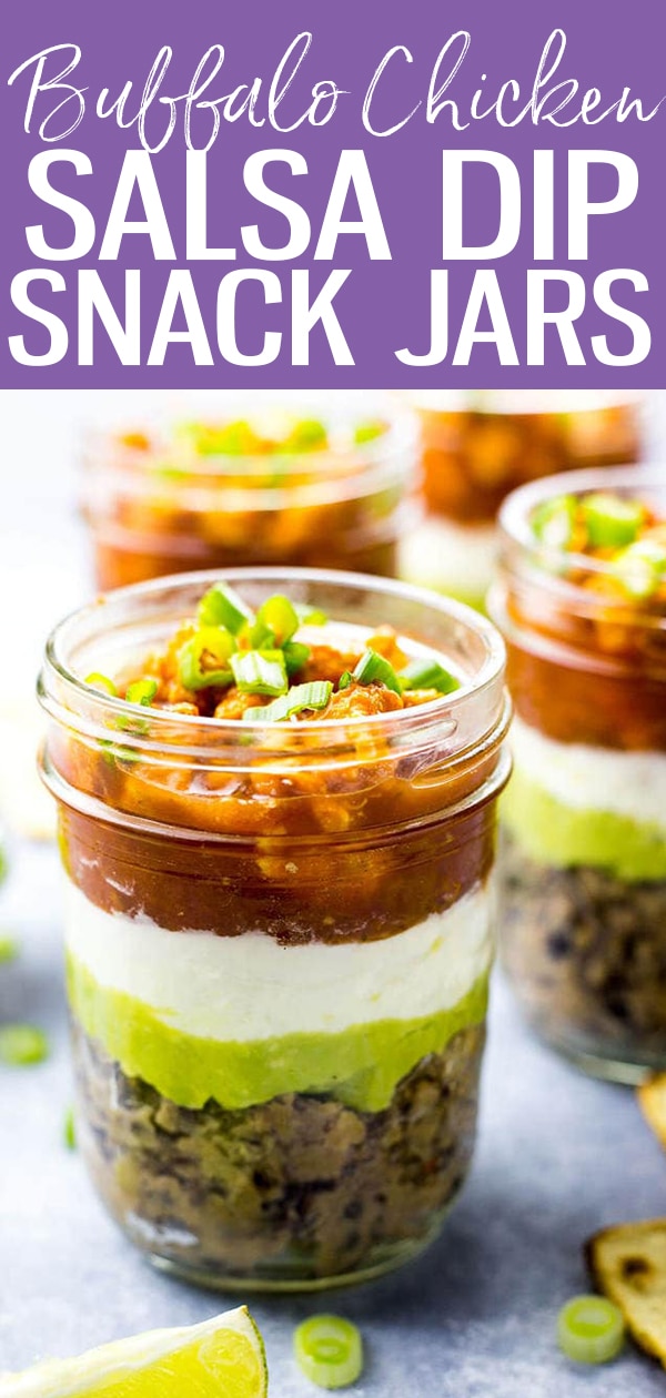 TheseMini 5-Layer Buffalo Chicken Salsa Dip Jars are the perfect grab and go snack for busy days - refried black beans, guacamole, sour cream, salsa and buffalo chicken for the win! #salsadip #masonjar #mealprep #healthysnack