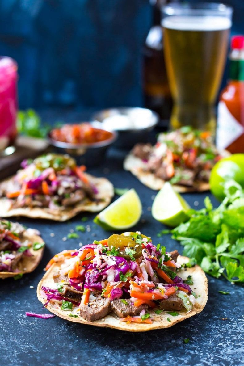 These Kalbi Beef Tacos are seasoned with sesame oil for an Asian-inspired flair, then topped with a delicious citrus slaw, pickled red onion and jalapenos!