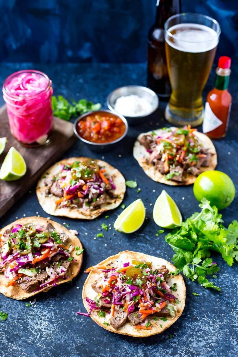 These Kalbi Beef Tacos are seasoned with sesame oil for an Asian-inspired flair, then topped with a delicious citrus slaw, pickled red onion and jalapenos!