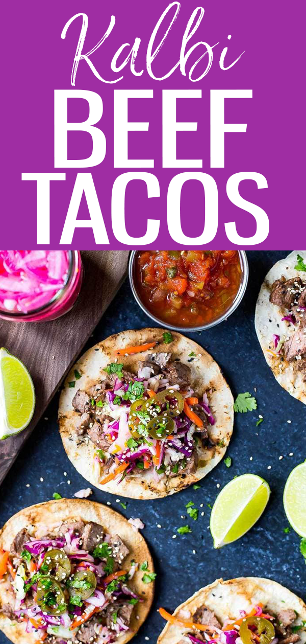 These Kalbi Beef Tacos are seasoned with sesame oil, then topped with a delicious citrus slaw, pickled red onion and jalapenos! #kalbibeef #beeftacos