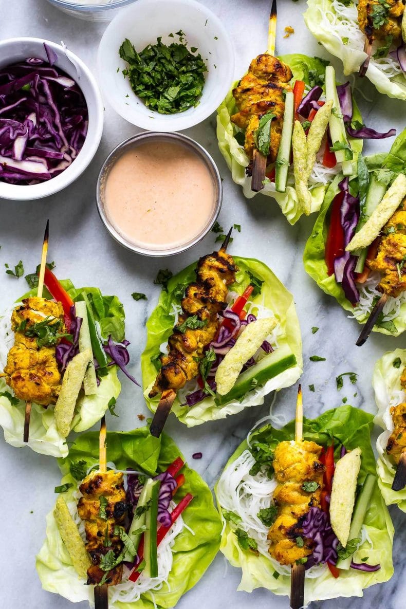 These Chicken Satay Lettuce Wraps with an easy coconut-peanut dipping sauce, tons of veggies and vermicelli noodles are a deliciously light dinner or fun, healthy appetizer!