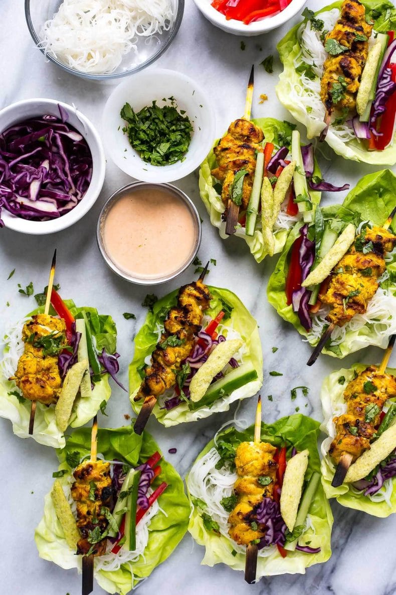 These Chicken Satay Lettuce Wraps with an easy coconut-peanut dipping sauce, tons of veggies and vermicelli noodles are a deliciously light dinner or fun, healthy appetizer!
