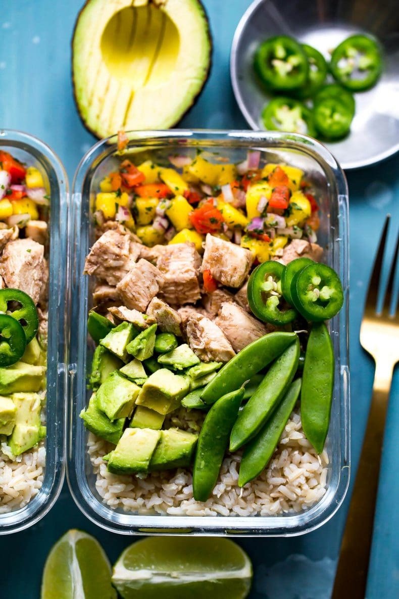 These Meal Prep Jerk Chicken Rice Bowls are the most delicious Caribbean-inspired lunch idea with mango salsa, avocado, jalapenos and brown rice!