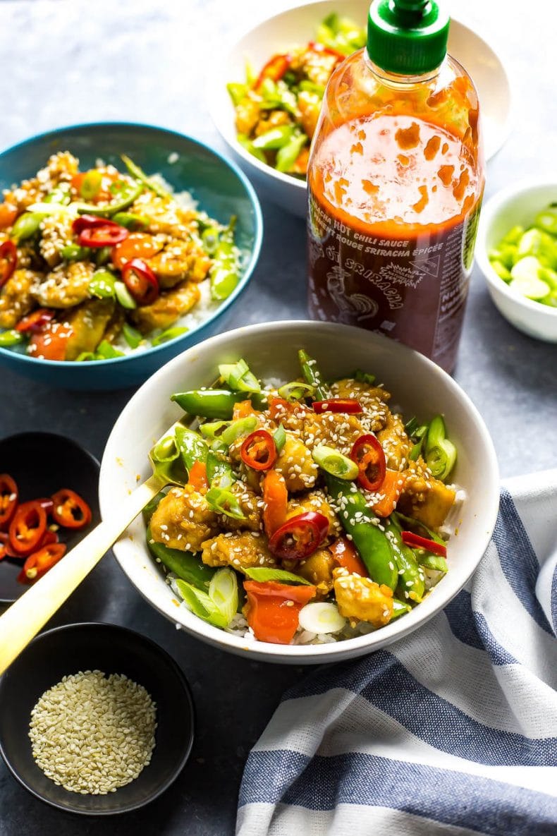 These 20-Minute Sesame Chicken Rice Bowls with jasmine rice and snap peas are a healthy takeout substitute, and ready in under half an hour!