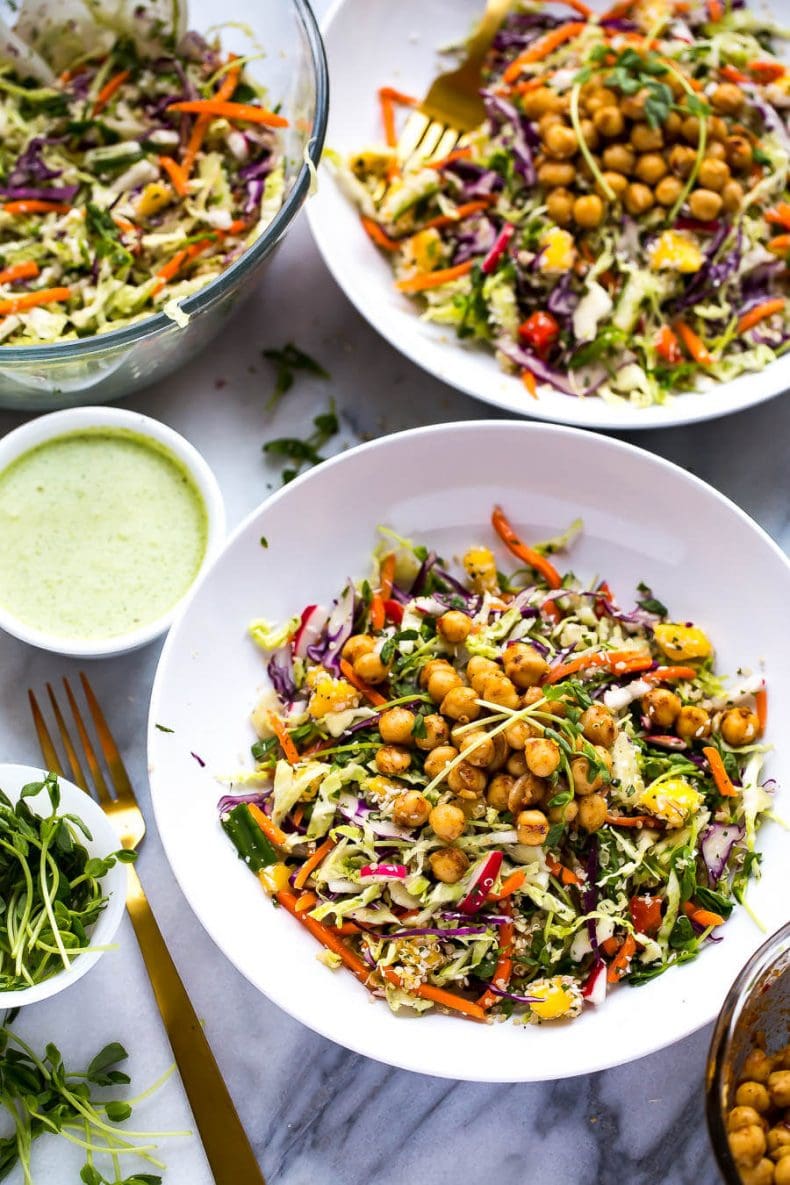 This Chickpea Quinoa Power Salad with Jalapeno Dressing is a delicious, vegetarian rainbow slaw with diced mango and 2-minute chili lime chickpeas!