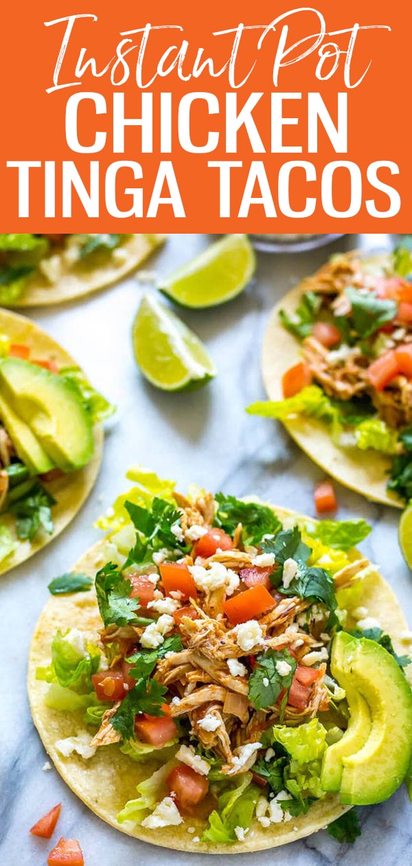 These Instant Pot Chicken Tinga Tacos are Mexican inspired - made with fire-roasted tomatoes & chipotle, they're gluten-free and ready in 30 minutes! #chickentinga #instantpot