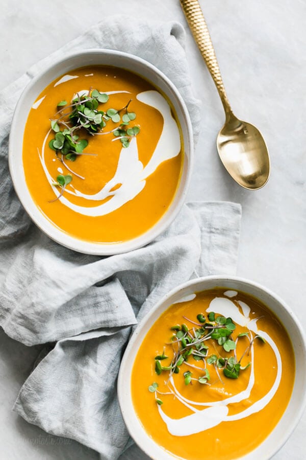 bowls of creamy carrot ginger soup
