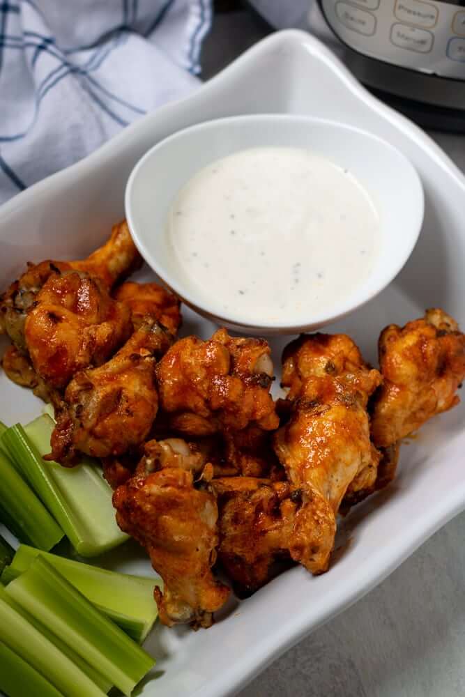 Instant Pot chicken wings with a side of blue cheese dressing