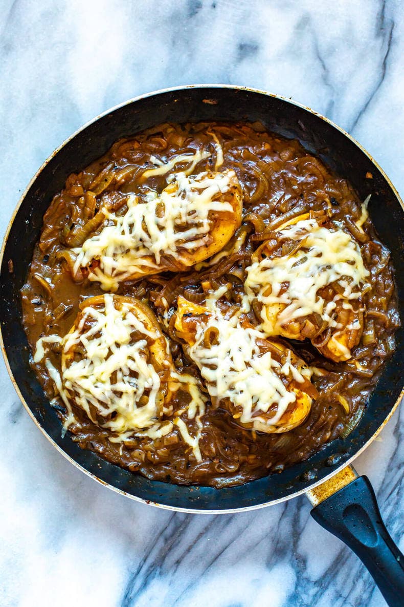 This French Onion Chicken Skillet is a delicious weeknight dinner that is a play on French onion soup and packed with protein, making it a full meal. This will become one of your favorite chicken skillet recipes! French Onion Chicken Skillet Meal
