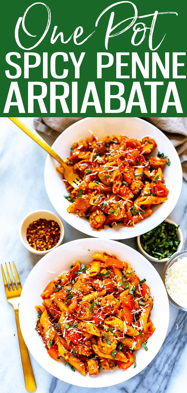 This Spicy Penne Arrabiata is filled with sausage, peppers and onions in a spicy tomato sauce - it comes together in 30 minutes in one pot too! #pennearriabata #onepotpasta