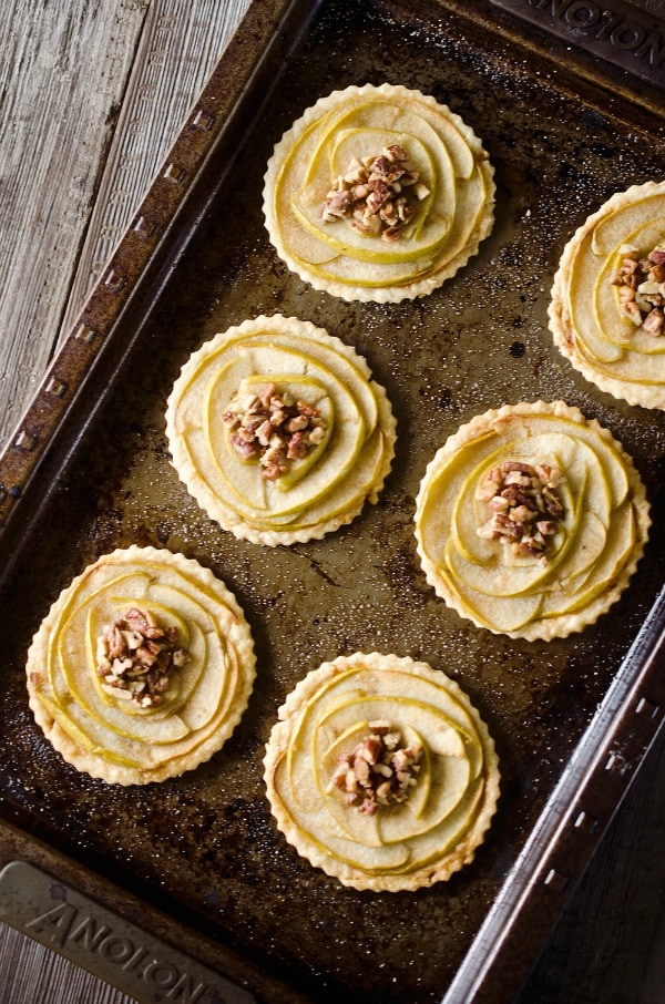 apple browned butter tarts on a baking sheet