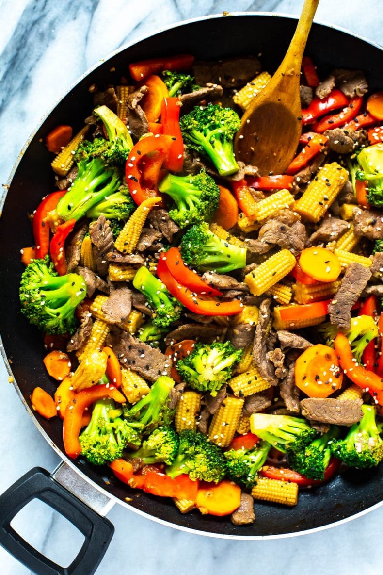 beef and broccoli stir fry in skillet