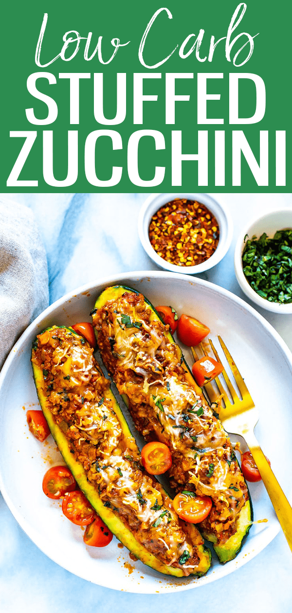These BEST EVER Italian Stuffed Zucchini Boats are filled with bolognese sauce and mozzarella cheese – they're a healthy, low carb dish! #zucchiniboats #lowcarb