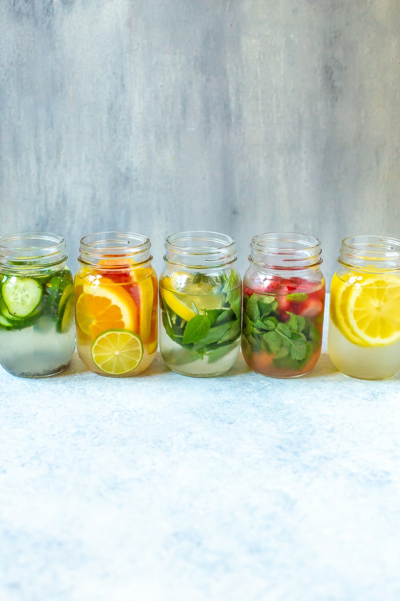 image shows how to make lemon water 5 different ways