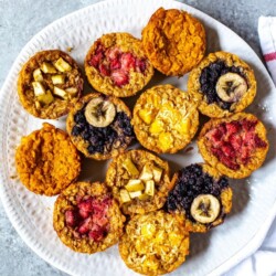 Meal Prep Baked Oatmeal Cups on a plate with a napkin on the side