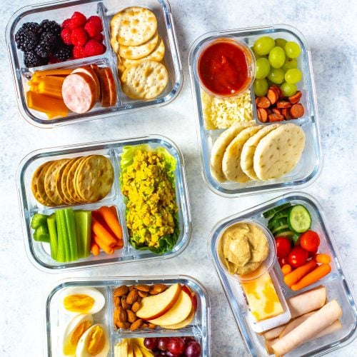 5 Healthy Bento Lunch Boxes all photographed on an angle, zoomed out