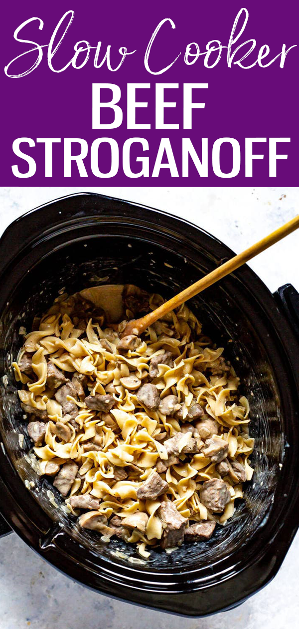 This Crock Pot Beef Stroganoff is the ultimate comfort food made in the slow cooker with sour cream and stewing beef - it's a delicious classic! #slowcooker #beefstroganoff