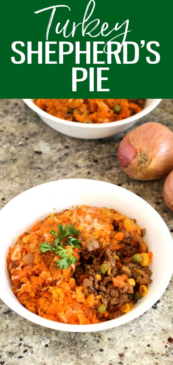 It's time for a healthier spin on the traditional Shepherd's Pie recipe, made with ground turkey & topped with a simple, yet hearty carrot and rutabaga mash! #shepherdspie #groundturkey