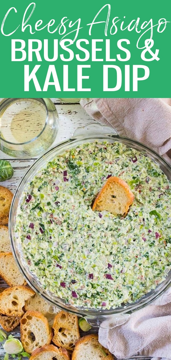 This Cheesy Asiago Brussels Sprouts & Kale Dip is sure to be a hit for holiday parties - it's a fall-themed version of spinach and artichoke dip! #brusselssprouts #kale #dip
