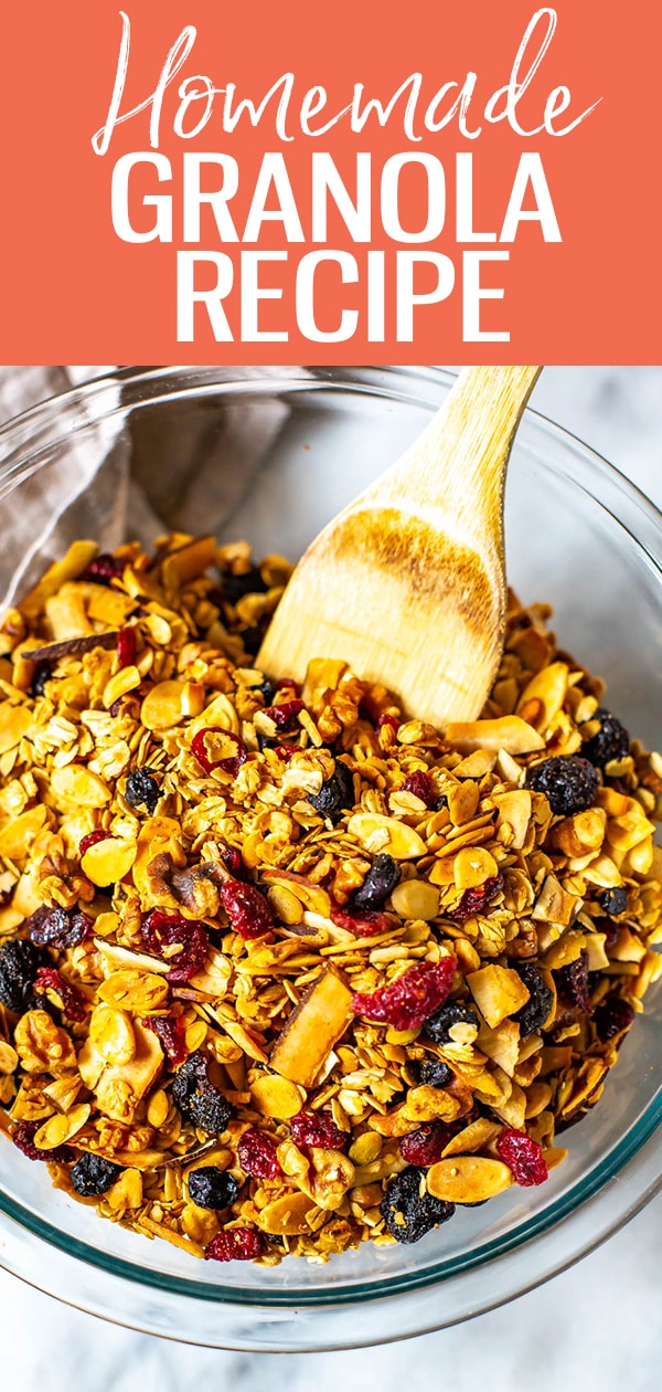 This healthy Homemade Granola Recipe is the BEST & easy to make with no refined sugars! Just add rolled oats, nuts, coconut, dried berries & maple syrup! #homemadegranola