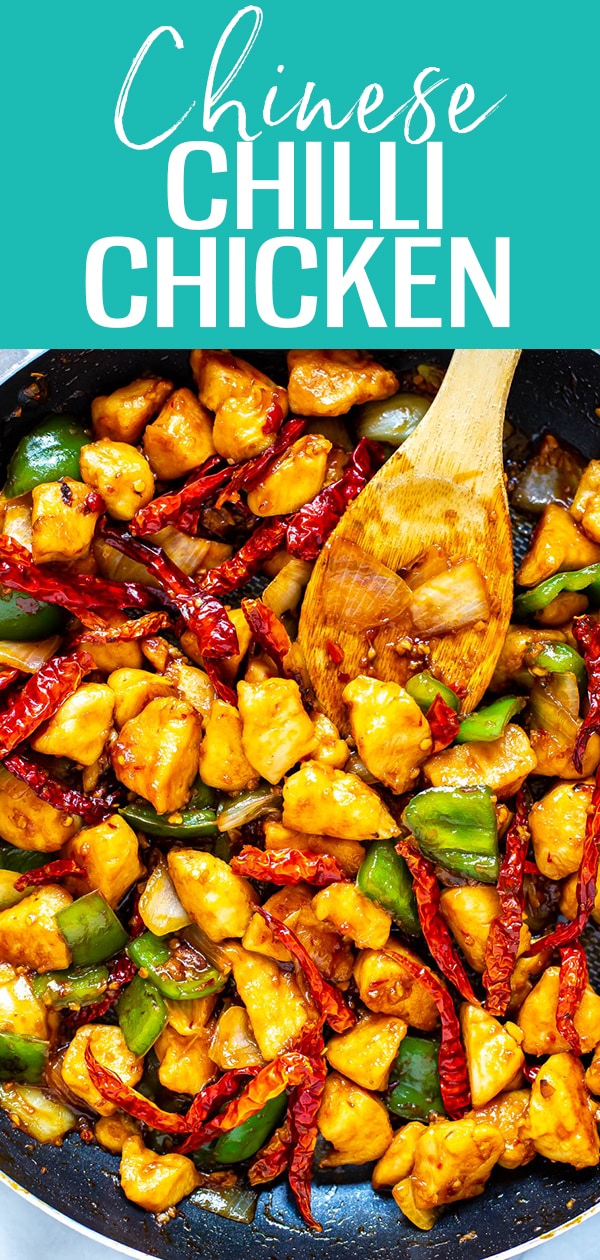 This Chilli Chicken is inspired by Chinese takeout - it's the perfect blend of sweet & spicy chicken stir fried with onions and green peppers, then served over rice! #chillichicken #mealprep