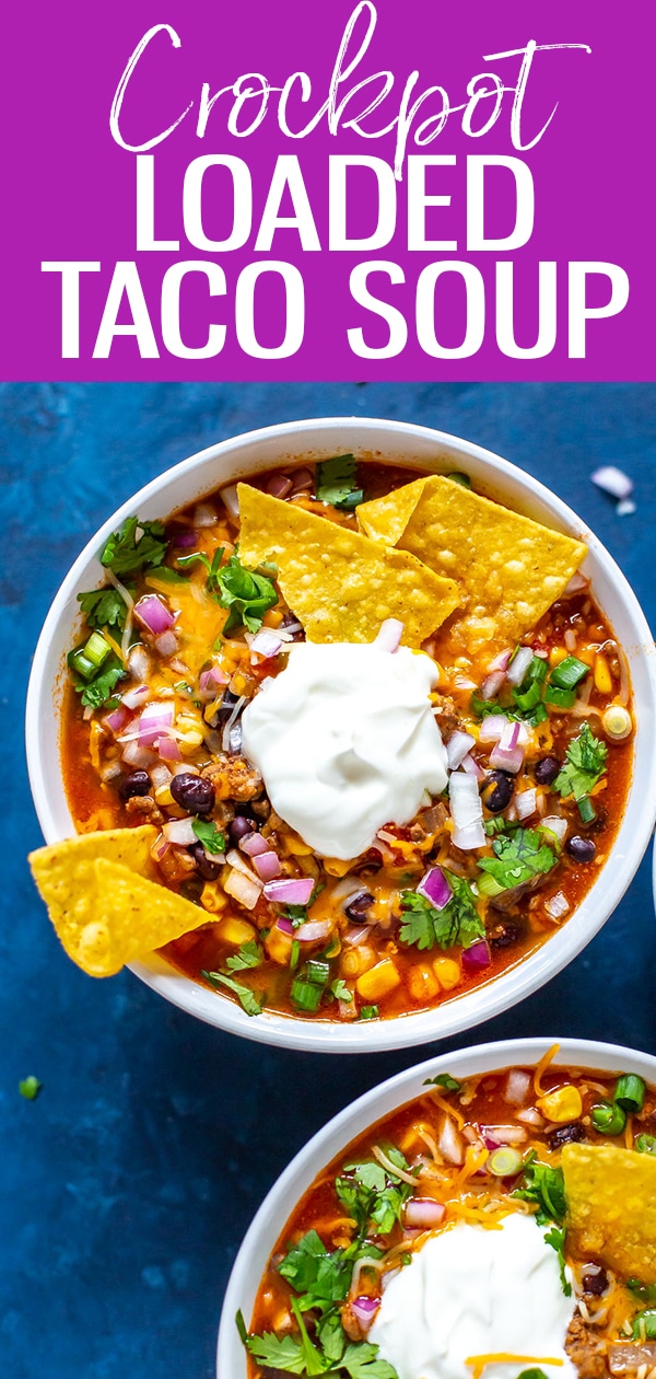 This is the easiest Crockpot Taco Soup! Brown ground beef, then dump in black beans, diced tomatoes & corn before loading up with tortilla chips & cheese #crockpot #tacosoup