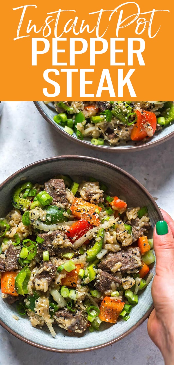 This Easy Instant Pot Pepper Steak is a delicious 30-minute dinner idea that is packed with bell peppers, onions, sirloin steak and a tasty soy-pepper sauce! #instantpot #peppersteak
