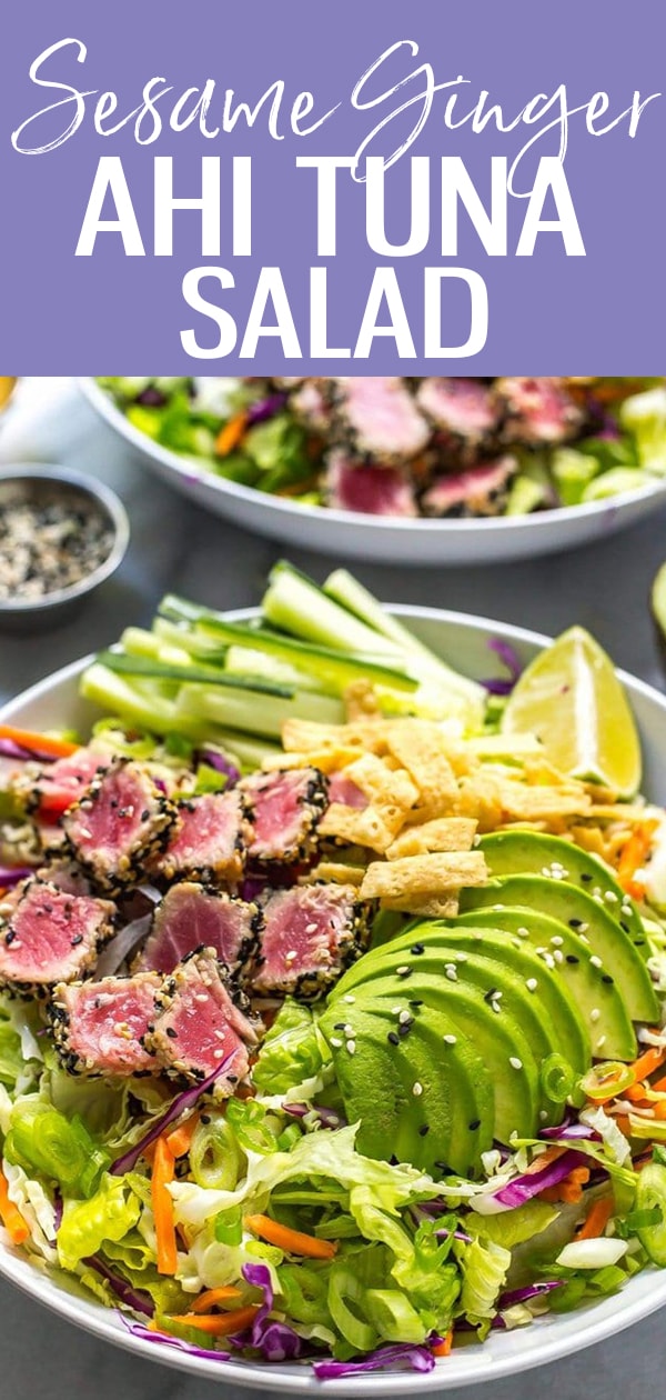 This Ahi Tuna Salad is a colorful, vibrant dish served with seared tuna steaks, sliced avocado, crunchy wontons and a sushi-style sesame ginger dressing #ahitunasalad