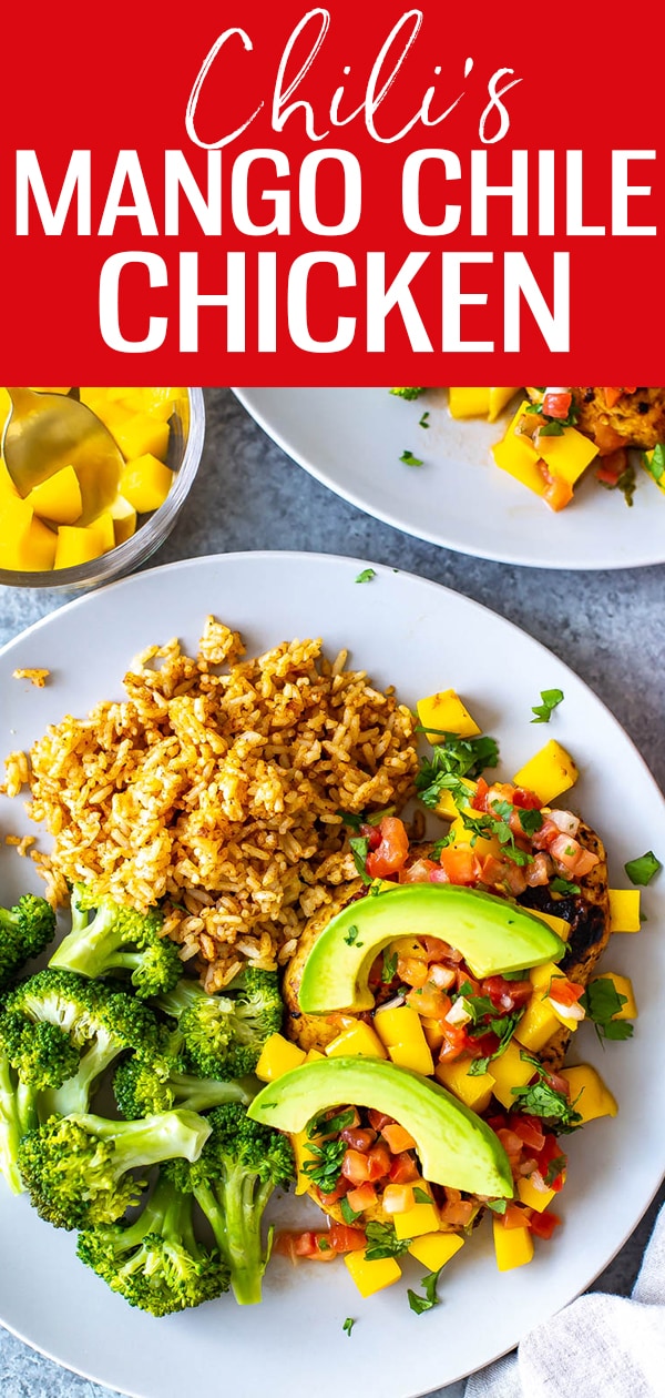 This Mango Chile Chicken is a perfect Chili's copycat. It's loaded with chile spices, mango glaze & topped with diced mango, cilantro, pico and avocado. #mangochilechicken #chilis