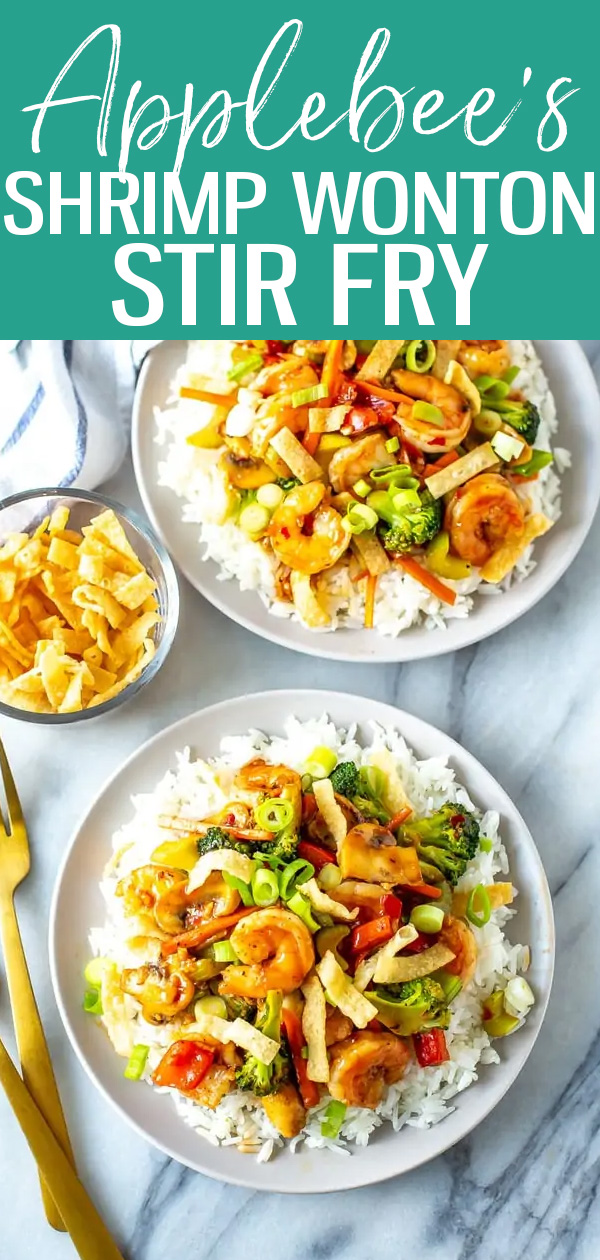 This Shrimp Wonton Stir Fry is an Applebee's copycat tossed in a sweet and spicy sauce, served over rice and topped with wonton strips. #applebees #shrimpwontonstirfry