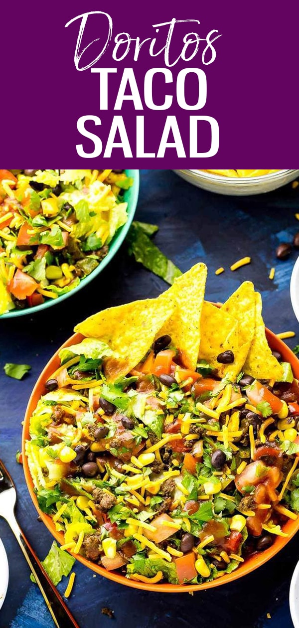 This Doritos Taco Salad is a delicious 20-minute dinner filled with fresh veggies and Cool Ranch Doritos, then topped with cheese, cilantro and taco sauce! #doritos #tacosalad