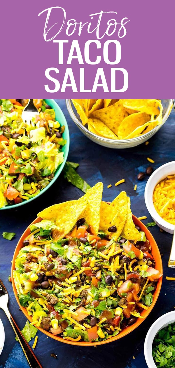 This Doritos Taco Salad is a delicious 20-minute dinner filled with fresh veggies and Cool Ranch Doritos, then topped with cheese, cilantro and taco sauce! #doritos #tacosalad