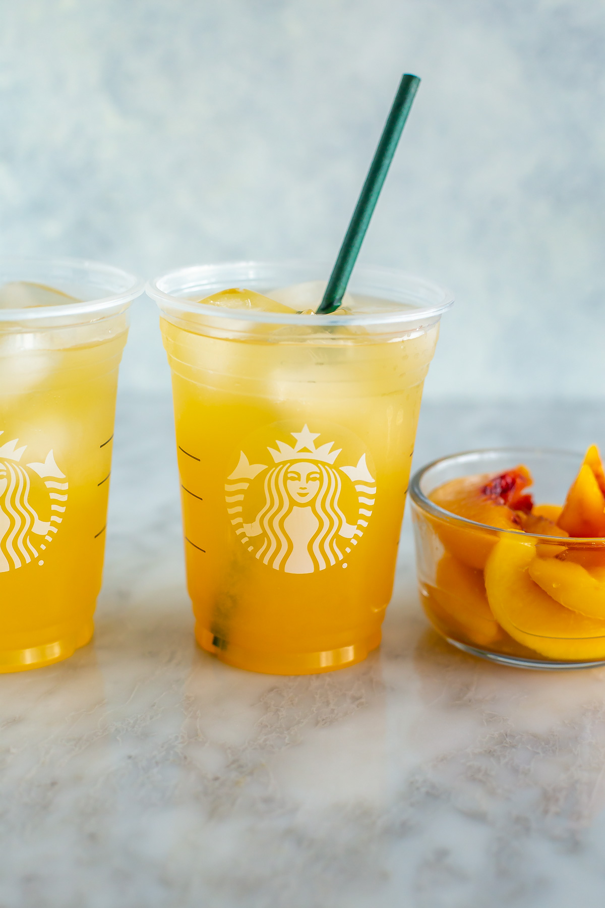 A copycat Starbucks iced peach green tea lemonade.