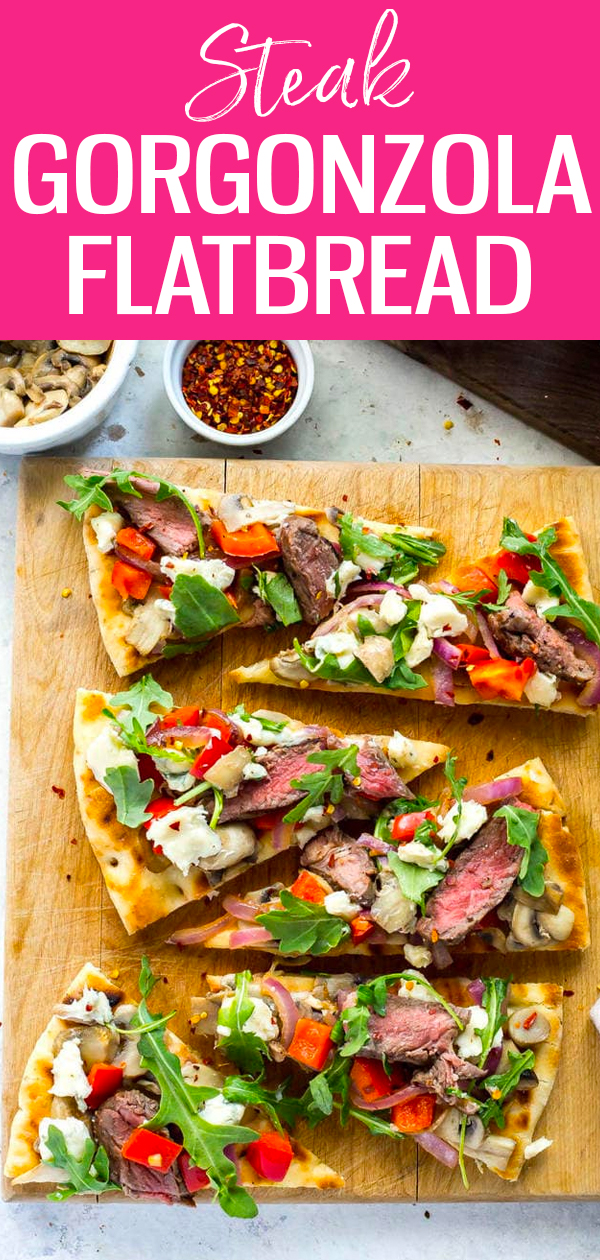 This Grilled Steak Gorgonzola Flatbread is a lighter dish made with gorgonzola cheese and fresh veggies that's ready in just 30 minutes! #flatbreadpizza #arugulasteak