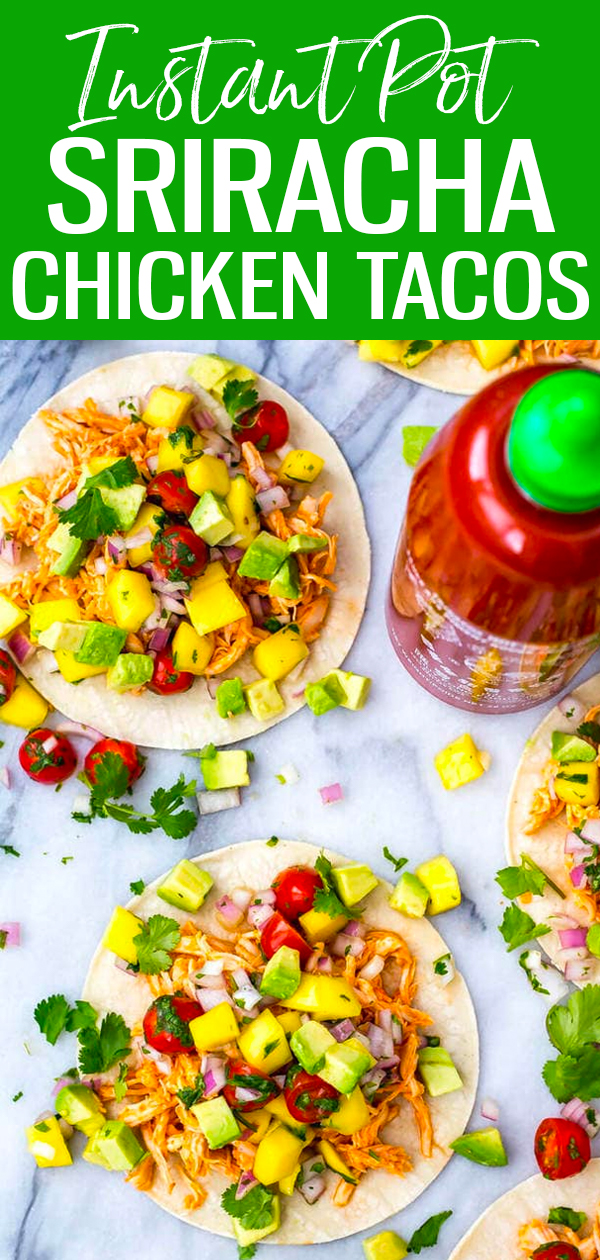 These Instant Pot Sriracha Chicken Tacos are a healthy and delicious 30-minute meal idea served with homemade mango and avocado salsa. #chickentacos #instantpot