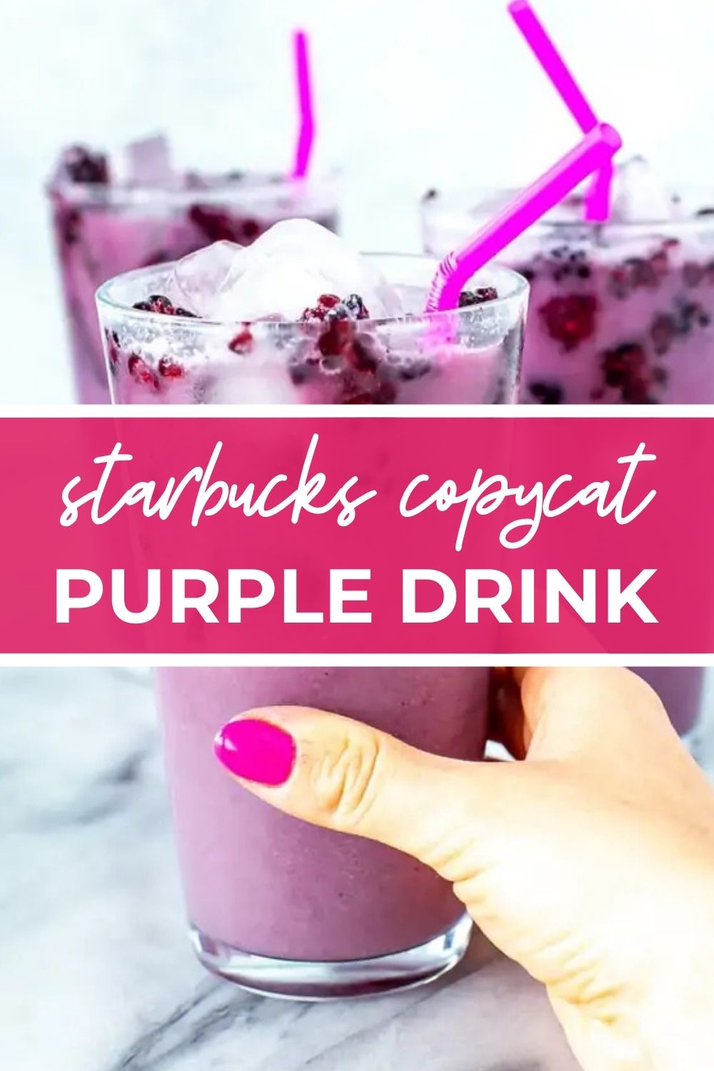 Hand holding a purple drink