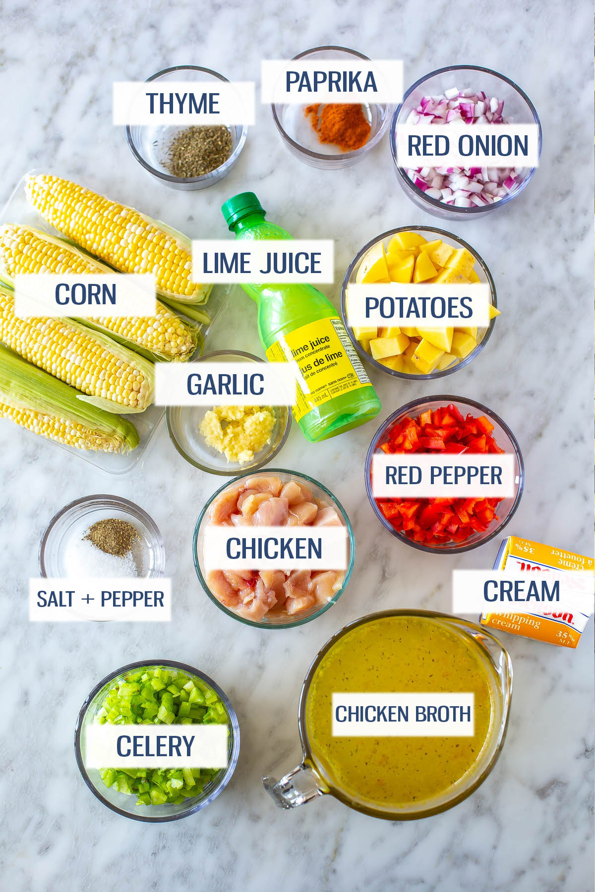 Ingredients for chicken corn chowder: thyme, paprika, red onion, corn, lime juice, potatoes, garlic, red pepper, chicken breast, cream, celery, chicken broth, salt and pepper.