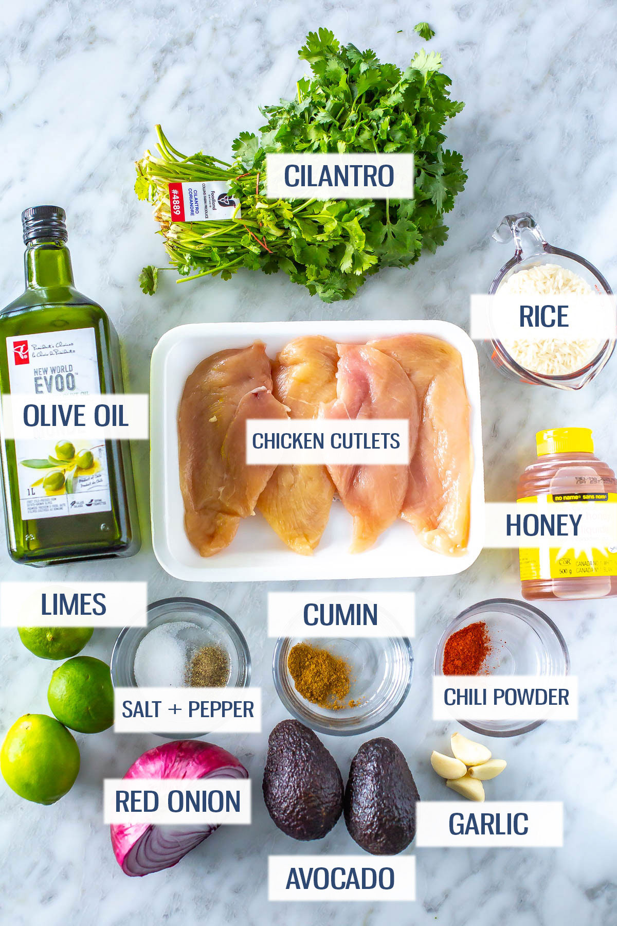 Ingredients for cilantro lime chicken and rice: cilantro, olive oil, chicken cutlets, rice, limes, cumin, chili powder, red onion, avocado, garlic, salt and pepper.