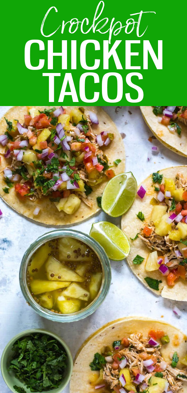 These Crockpot Chicken Tacos with Pineapple Salsa are so fun - use the chicken for tacos, burrito bowls, salads and more! #slowcooker #chickentacos