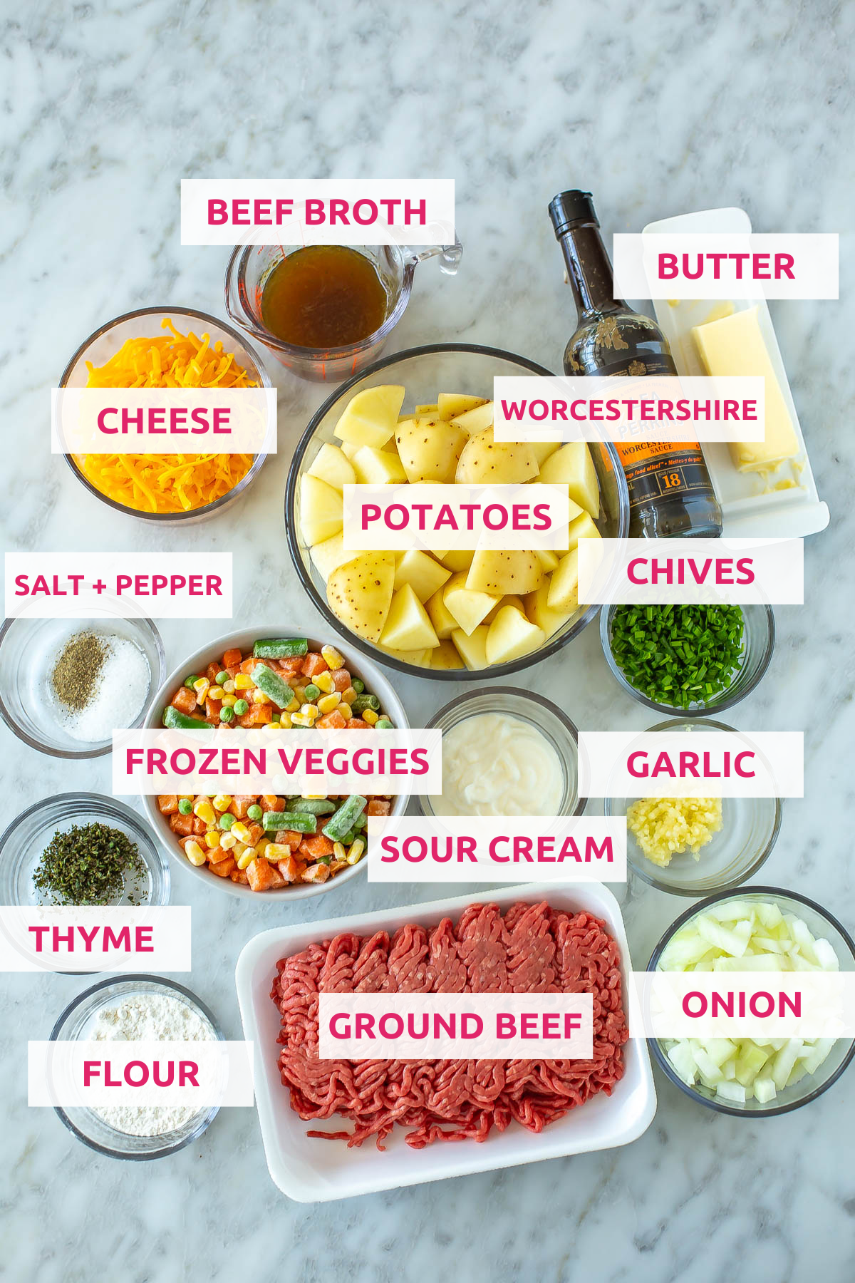 Ingredients for classic shepherd's pie: beef broth, cheese, butter, potatoes, worcestershire, frozen veggies, thyme, chives, sour cream, garlic, ground beef, onion, flour, salt and pepper.