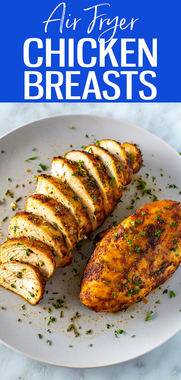 These Air Fryer Chicken Breasts are so juicy and tender - you'll love the easy marinade! Serve them in a salad or with your favourite sides. #airfryer #chickenbreasts