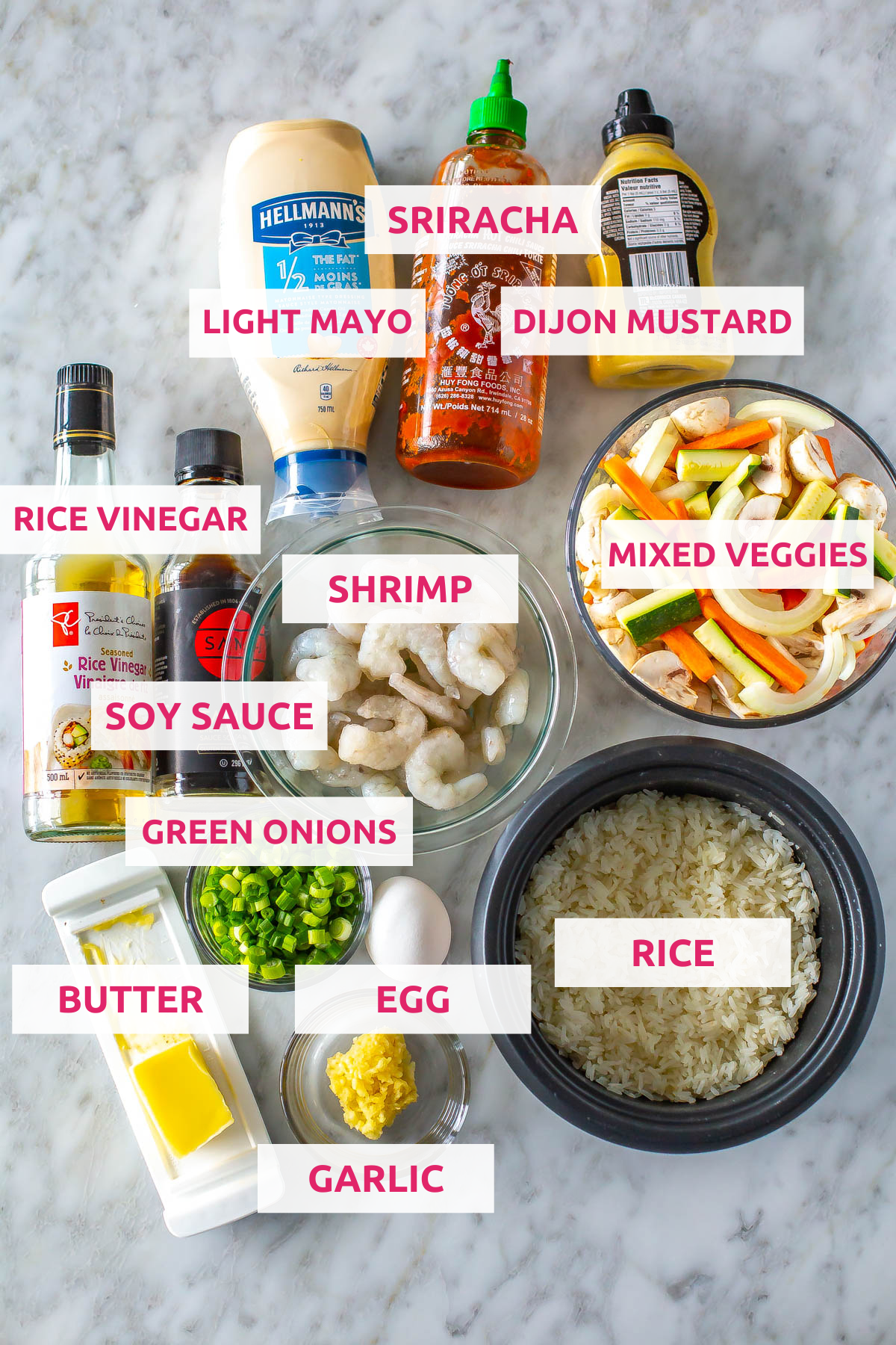 Ingredients for hibachi shrimp: light mayo, sriracha, dijon mustard, rice vinegar, soy sauce, shrimp, mixed veggies, butter, green onion, egg, rice, and garlic. 