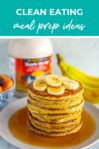 Shot of healthy two-ingredient pancakes with syrup and bananas in the background