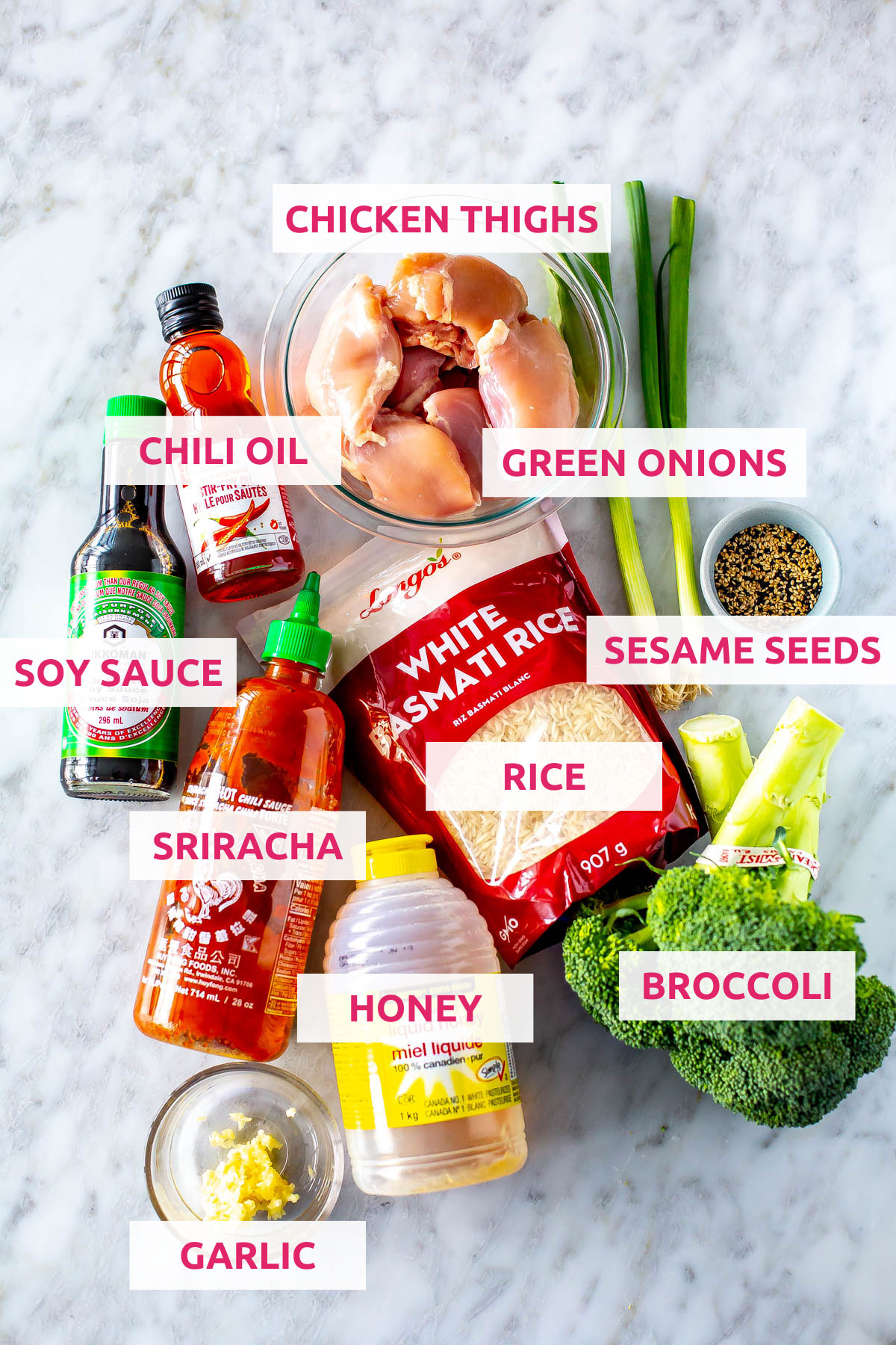 Ingredients for slow cooker chicken thighs: chicken thighs, green onions, sesame seeds, broccoli, sriracha, garlic, honey, chili oil and soy sauce.