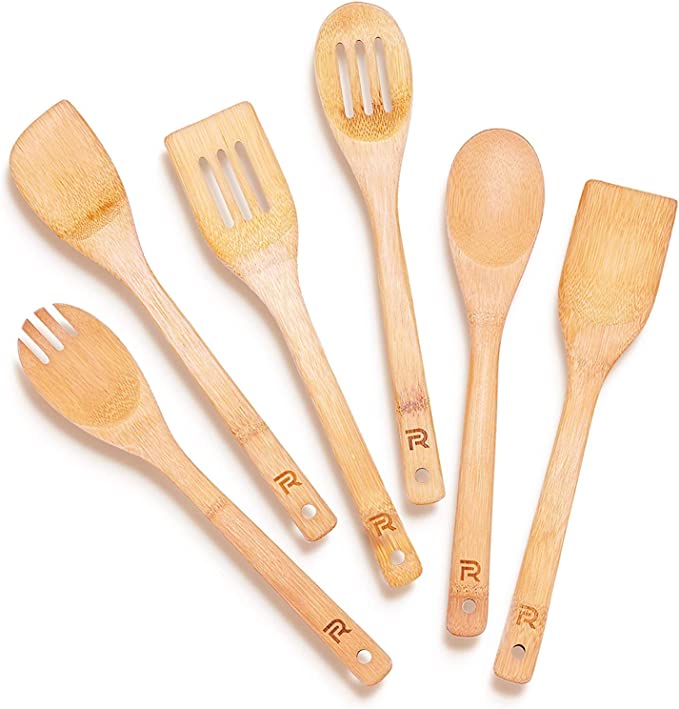 A set of wooden spoons and utensils made out of bamboo.