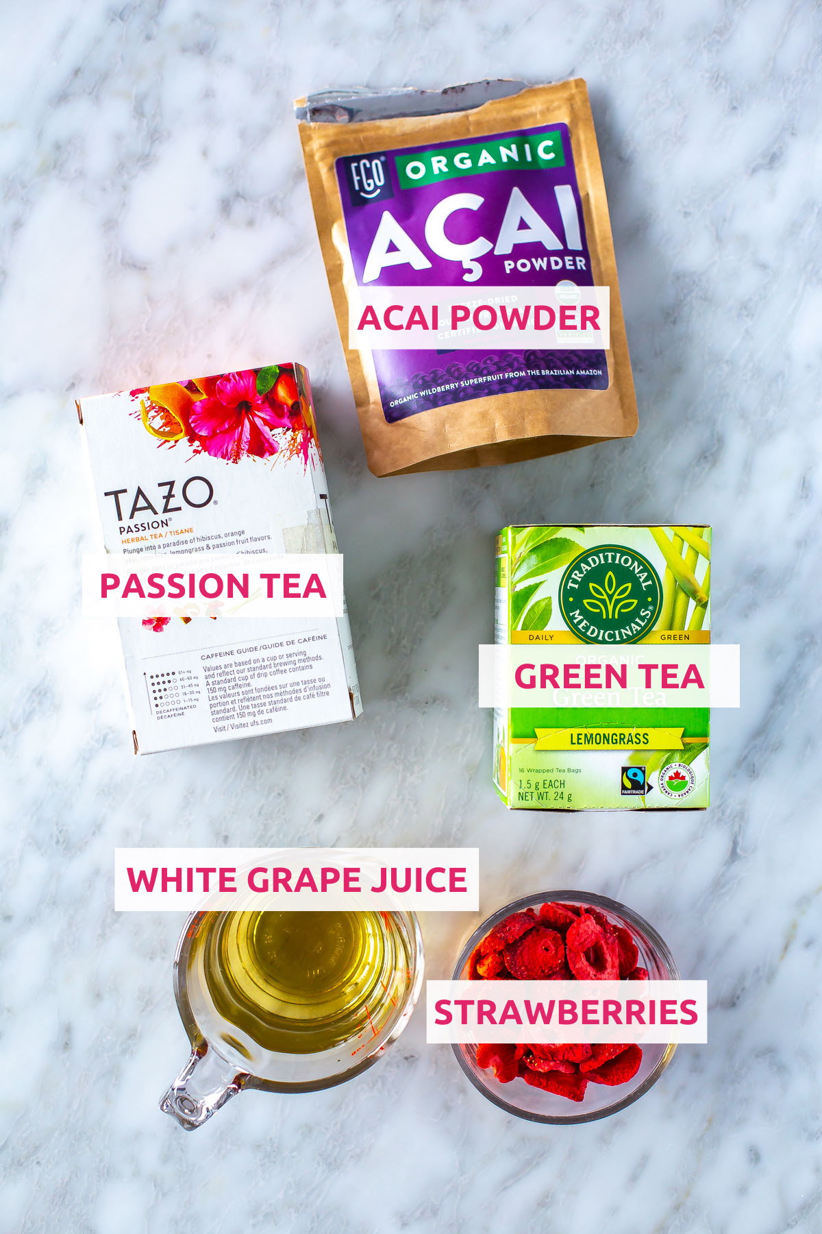 Ingredients for Starbucks strawberry acai refresher: passion tea, green tea, acai powder, white grape juice and strawberries.